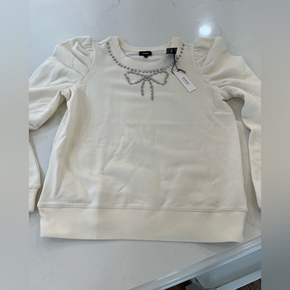 Express Cream Sweatshirt with rhinestone Bow Accent